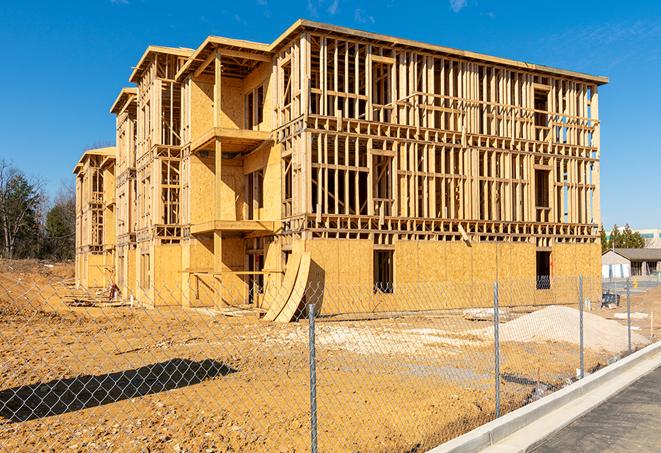 a snapshot of temporary chain link fences protecting a large construction project from unauthorized access in Carmichael